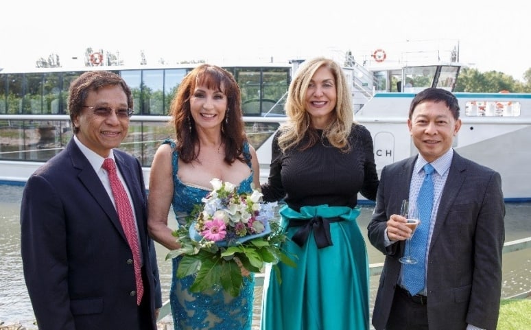 Genting Hong Kong Chairman and CEO Tan Sri Lim Kok Thay; Crystal Bach Godmother Anna-Maria Kaufmann; Crystal CEO and President Edie Rodriguez; and Genting Hong Kong Group President Colin Au at the Christening of Crystal Bach (PRNewsfoto/Crystal River Cruises)